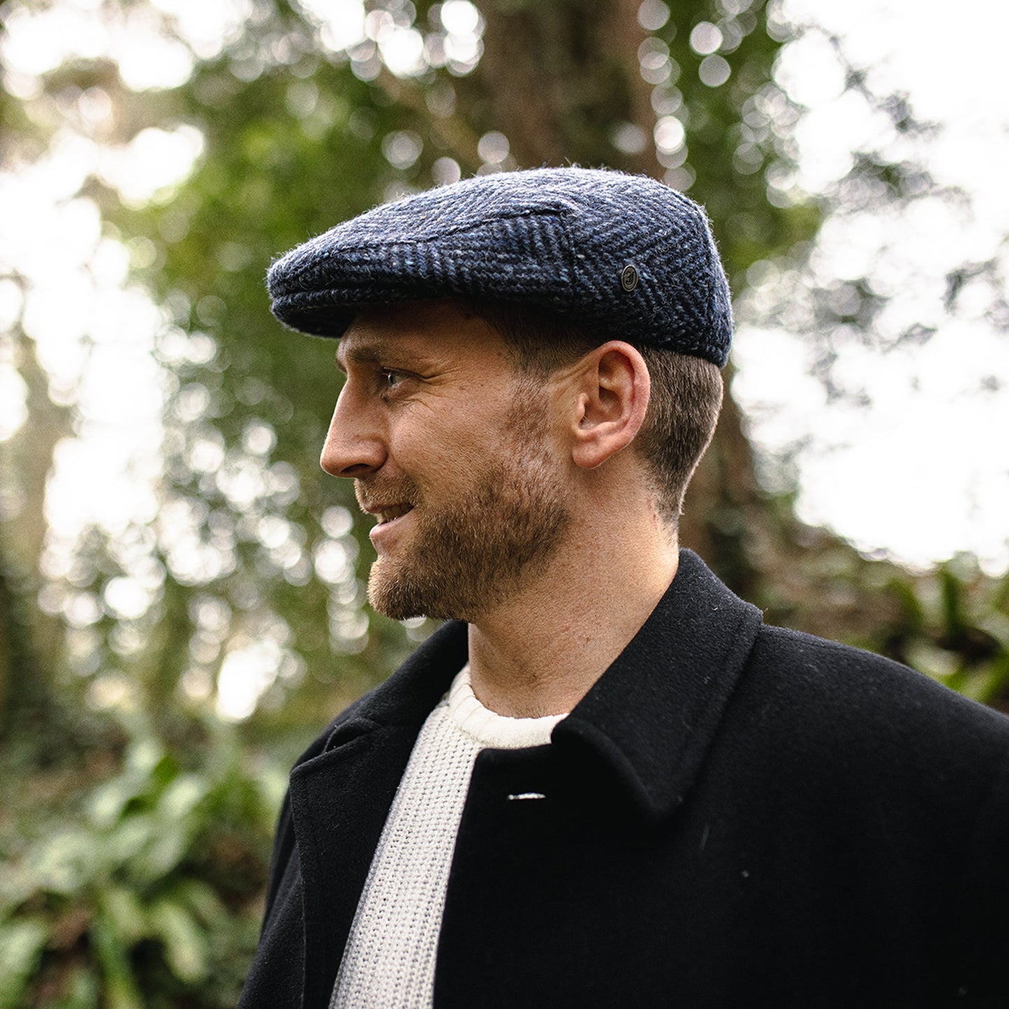 Casquette Plate en Tweed du Donegal Épais à Chevrons Dunmore bleu marine-noir JAXON & JAMES